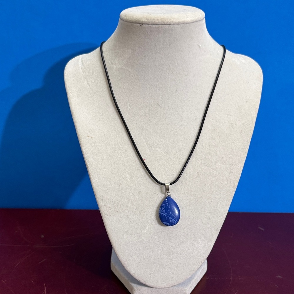 Sleek Natural Crystal Blue Pendant Necklace on Black Cord